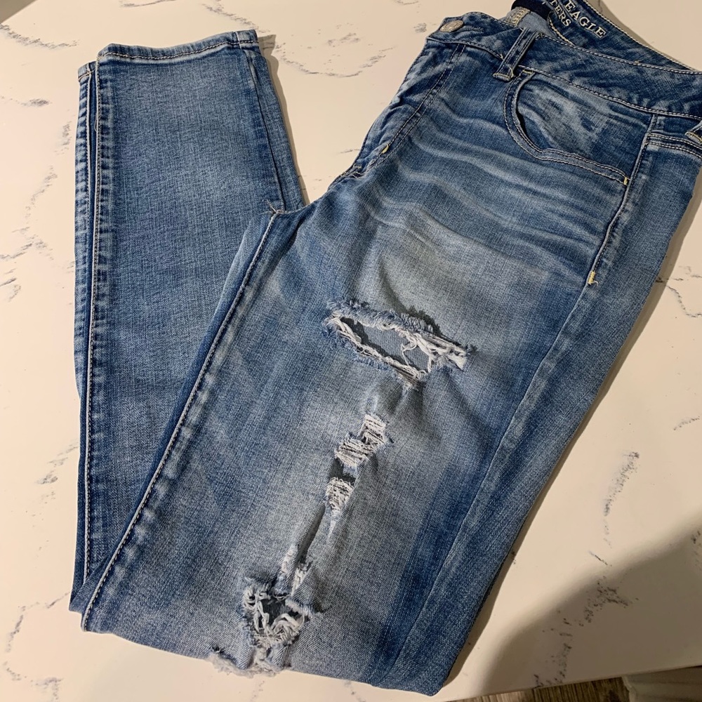 Ripped faded blue jeans